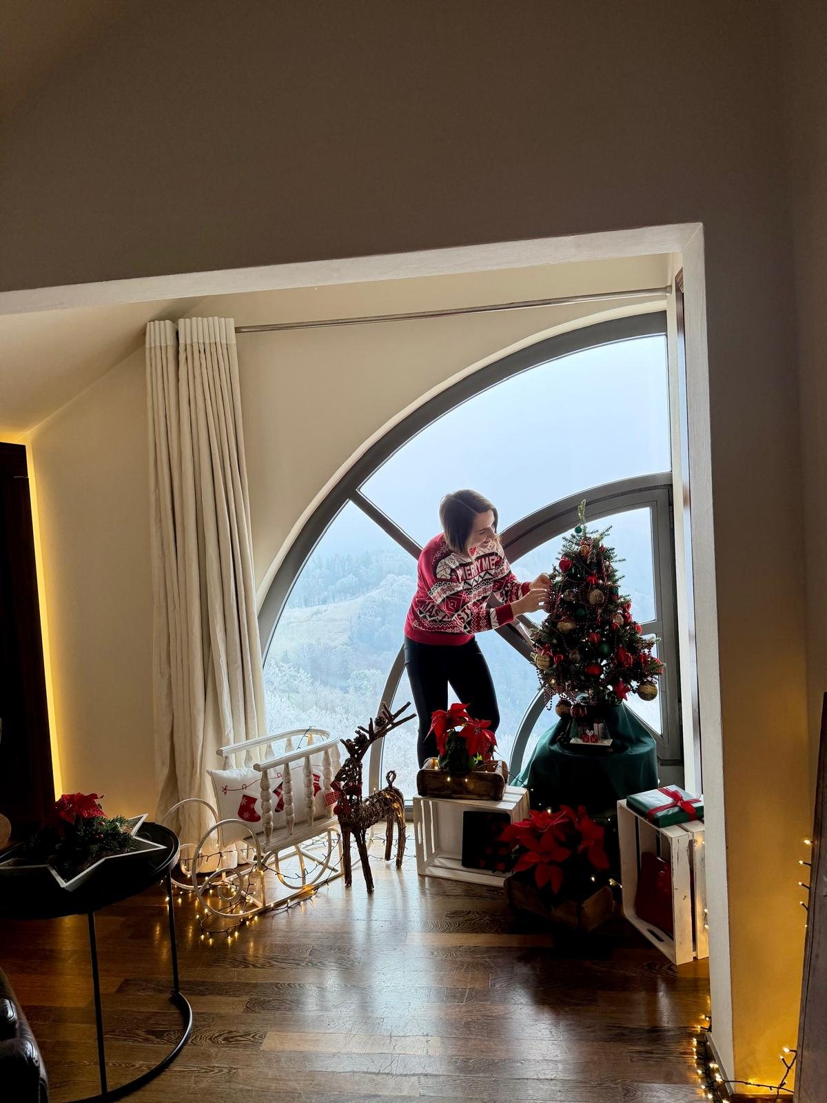 Proposal decoration being set up in a hotel suite with a mountain view