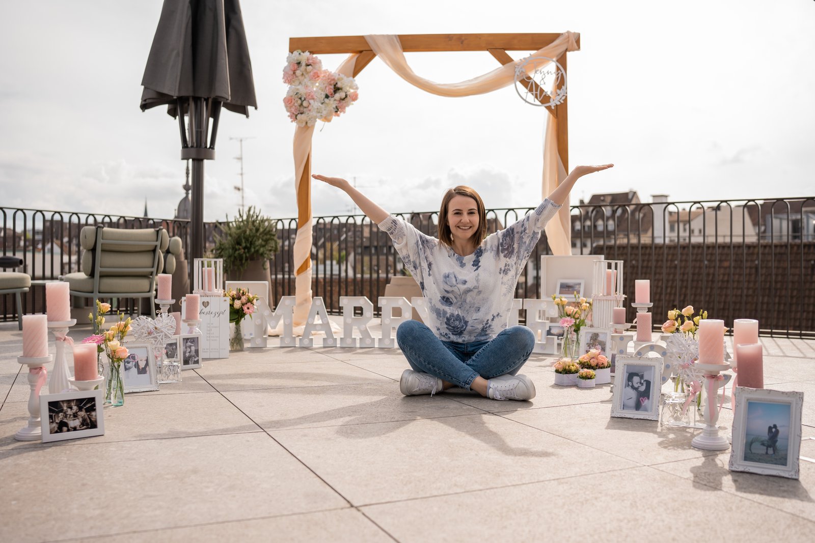 Jessica Thomann in front of a proposal setup she has just finished building on a rooftop terrace in Basel